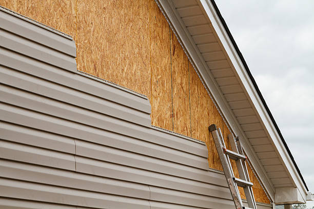Professional Siding Installation technician working in Monmouth Junction, NJ